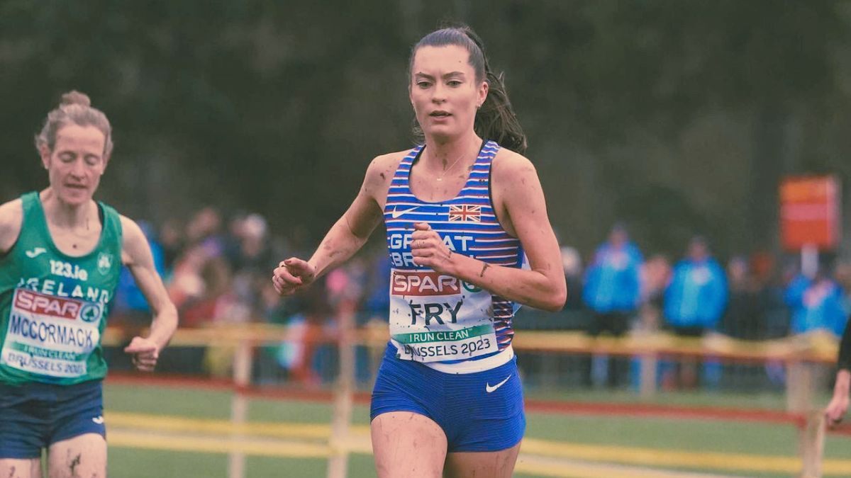 Coach writing a personalised running training plan for an individual athlete